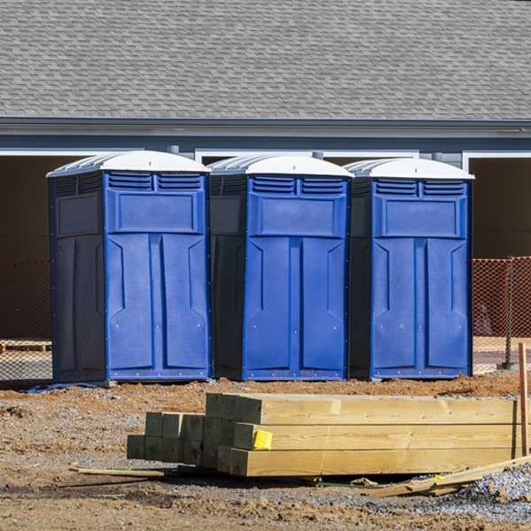 how often are the portable toilets cleaned and serviced during a rental period in Downs Kansas